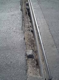 Damaged concrete on a bridge deck