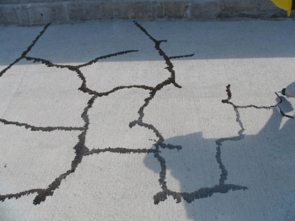 Smooth, newly repaired concrete on a bridge deck